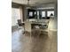 Formal dining area featuring tile floors, stylish chairs, and decorative lighting at 2806 Polson Dr, Kissimmee, FL 34758