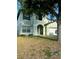 Lovely two-story house with well-maintained lawn and green accents at 2806 Polson Dr, Kissimmee, FL 34758