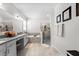 Bright bathroom with a soaking tub, glass-enclosed shower, and double vanity at 2926 Wordsmith Rd, Kissimmee, FL 34746
