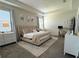 Comfortable bedroom with a king bed, soft natural light, and desk at 2926 Wordsmith Rd, Kissimmee, FL 34746