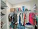 This walk-in closet has metal shelving and plenty of storage at 3033 Beau Loop, Tavares, FL 32778
