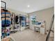 Spacious walk-in closet with open storage and a vanity area at 3033 Beau Loop, Tavares, FL 32778