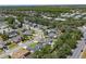 A beautiful neighborhood featuring mature trees, well-maintained lawns and landscaping, and sidewalks at 3137 Timucua Cir, Orlando, FL 32837