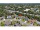 Aerial view of a suburban neighborhood with mature trees, sidewalks, and manicured lawns at 3137 Timucua Cir, Orlando, FL 32837