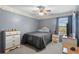 Bedroom with ceiling fan and neutral walls at 3137 Timucua Cir, Orlando, FL 32837