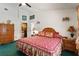Comfortable bedroom with carpet, side tables and lamps on each side of the bed, and a closet at 3137 Timucua Cir, Orlando, FL 32837