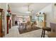 Elegant dining room features a fireplace, classic furniture, and sliding glass doors to the outdoor area at 3137 Timucua Cir, Orlando, FL 32837
