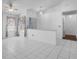 Bright room featuring tiled flooring, neutral walls, ceiling fan, and a window overlooking the front yard at 3137 Timucua Cir, Orlando, FL 32837