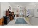 Bright room featuring tile floors, a ceiling fan and a glass table at 3137 Timucua Cir, Orlando, FL 32837