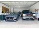 Spacious two car garage with light colored walls and flooring at 3534 Woodley Park Pl, Oviedo, FL 32765
