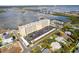 A high angle shot showcasing a condo community with views of the waterway, bridge, and abundant parking at 3606 S Peninsula Dr # 707, Port Orange, FL 32127