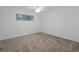 Bedroom showcasing neutral colored walls, carpeted floors, and ceiling fan at 3606 S Peninsula Dr # 707, Port Orange, FL 32127