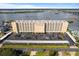 An impressive building featuring multiple levels, parking, and beautiful water views in the backdrop at 3606 S Peninsula Dr # 707, Port Orange, FL 32127