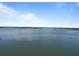 A scenic aerial view of a lake and nearby islands and waterways at 3606 S Peninsula Dr # 707, Port Orange, FL 32127