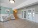 Inviting lobby area with comfortable seating and elegant decor near exterior access doors at 3606 S Peninsula Dr # 707, Port Orange, FL 32127