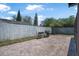 Paved backyard space with a weathered white fence and room for outdoor dining at 3889 Biscayne Dr, Winter Springs, FL 32708