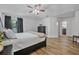 The primary bedroom features a ceiling fan and wood flooring at 3889 Biscayne Dr, Winter Springs, FL 32708