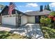 Exterior of the house with stone accents and a driveway made of brick pavers at 3889 Biscayne Dr, Winter Springs, FL 32708