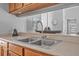 A kitchen sink with a modern faucet is placed on a countertop at 3889 Biscayne Dr, Winter Springs, FL 32708