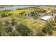 Aerial view showcasing community soccer fields, park, and lake for recreational amenities at 4219 Lillian Hall Ln, Orlando, FL 32812