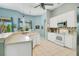 Bright kitchen with white cabinetry, ample counter space, and modern appliances at 4219 Lillian Hall Ln, Orlando, FL 32812