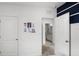 Coastal-themed bedroom featuring nautical themed wall art and a doorway leading into the bathroom at 4622 Barberry Ave, Lakeland, FL 33811