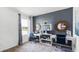Inviting home office with two desks, lake view, shelving, and stylish decor at 4622 Barberry Ave, Lakeland, FL 33811