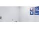 Bright laundry room with laundry-themed artwork and necessary hookups at 4622 Barberry Ave, Lakeland, FL 33811