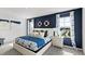 The main bedroom features a blue accent wall and nautical decor at 4622 Barberry Ave, Lakeland, FL 33811