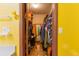 Walk-in closet with ample storage space and a view into the next room at 516 Orange Dr # 22, Altamonte Springs, FL 32701