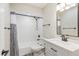 Newly renovated bathroom with a shower-tub combo, subway tile, and a marble countertop vanity at 5162 Tellson Pl, Orlando, FL 32812