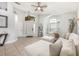 Bright living room with large windows, tile flooring, and modern decor at 525 Hardwood Cir, Orlando, FL 32828