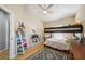 Childs bedroom with bunk beds, wood flooring, and ceiling fan at 561 Pinebranch Cir, Winter Springs, FL 32708