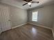 Bedroom with sleek floor, neutral paint, and a window with natural light at 613 Michigan Ave, St Cloud, FL 34769