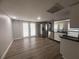 Kitchen and dining area with stainless steel appliances and light-filled room at 613 Michigan Ave, St Cloud, FL 34769