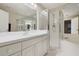 Bathroom boasts a vanity with white cabinets, a shower, and a bathtub at 688 W Cranes Cir, Altamonte Springs, FL 32701
