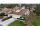 This lovely two-story home has an attached two-car garage and manicured lawn and landscaping at 688 W Cranes Cir, Altamonte Springs, FL 32701