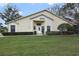 Inviting single-Gathering home with a manicured lawn and lush shrubbery enhancing its curb appeal at 688 W Cranes Cir, Altamonte Springs, FL 32701