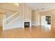Bright and spacious living room with high ceilings, a fireplace, and an inviting open layout at 688 W Cranes Cir, Altamonte Springs, FL 32701