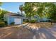 Charming two-story home with a well-manicured lawn and attached garage at 702 Glasgow Ct, Winter Springs, FL 32708