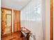 Light-filled room with hardwood floors, bright window, and a closet at 702 Glasgow Ct, Winter Springs, FL 32708
