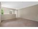 Bonus room featuring carpet and an open view into an adjoining room at 8031 Enchantment Dr # Ge, Windermere, FL 34786