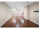 Bright living room featuring hardwood floors, neutral paint, and a welcoming open space at 8031 Enchantment Dr # Ge, Windermere, FL 34786