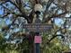 Lake Eola Heights Historic District sign surrounded by mature trees with Spanish moss at 806 E Amelia St, Orlando, FL 32803