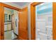 Open hallway leading to the kitchen and bathroom at 806 E Amelia St, Orlando, FL 32803