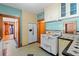 Charming kitchen with white appliances, wood accents, and a retro stove at 806 E Amelia St, Orlando, FL 32803