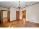 Spacious room with hardwood floors and multiple doorways at 806 E Amelia St, Orlando, FL 32803
