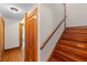 Hardwood staircase with natural lighting and wood trim at 806 E Amelia St, Orlando, FL 32803