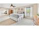 Bright main bedroom offering ample space, neutral decor, and large windows for plenty of light at 812 Seneca Meadows Rd, Winter Springs, FL 32708