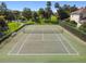 Aerial view of well maintained community tennis court with fresh paint at 812 Seneca Meadows Rd, Winter Springs, FL 32708